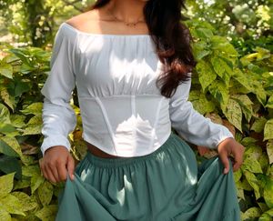White Corset Top And Green Maxi Skirt