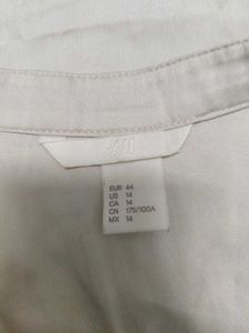 Combo Of Two Beige Satin Sleevless Tops