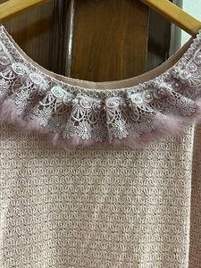 Tunic With Feather Detailing
