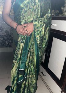Green &amp; Gold Patterned crepe Saree