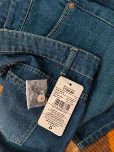 Ripped Wide Leg Denim Jeans