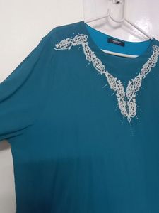 New Teal Tunic, pattern sleeves white embroidery