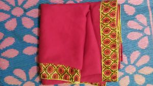 Pink Saree With Golden Border Design