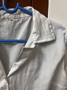 White Sleeveless Top