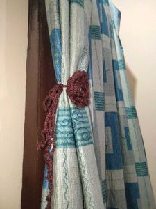 curtain holder brown colour