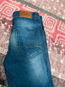 Distressed Blue Denim Jeans