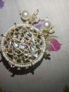 Earing And Tika