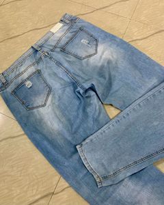 Light Blue Distressed Denim Jeans