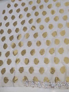White & Gold Saree with Floral Details