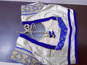Half net saree with stiched blouse and peticoat