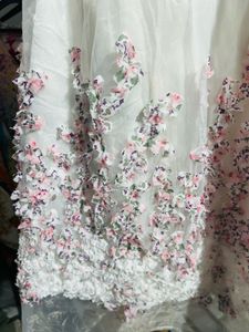 White dress with floral embroidery