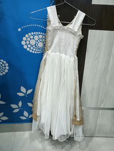 Beautiful white dress with golden flower work