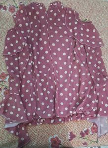 It's a Rose Colour Top With White Dots
