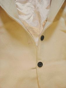 beige colour overcoat
