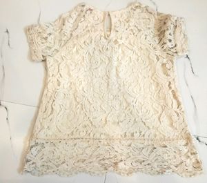womens round neck cream top