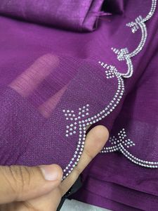 Elegant Purple Saree with Embellishments