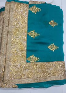 Elegant Teal & Gold Saree
