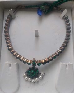 Custom made silver Addigai with green kempu stones