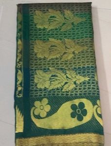 Unused Festive Wear Dark  Green Saree With Gold