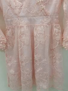 Girls Frock In Embroidered Net With White Beads.
