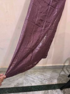 Heavy Work Purple Net Saree With Shiny Petticoat.