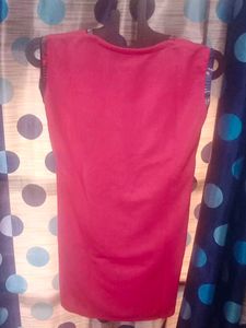 Red Sleeveless Top with Embellishments