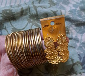 Plain Golden Bangles And Earrings