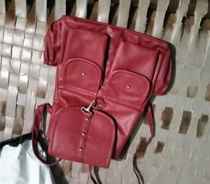 Red Backpack with Multiple Pockets