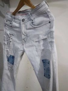 Distressed Denim Jeans