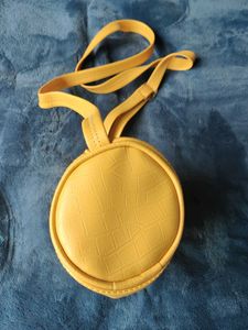 Circular Sides Stylish Mustard Sling Bag
