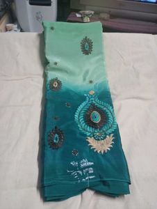 Elegant Green Embroidered creap Saree