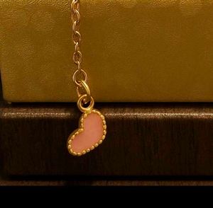 Rose Quartz Beaded Bracelet with Heart Charm
