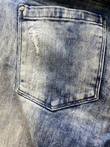 Ripped Blue Denim Jeans