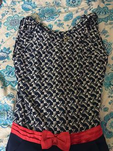 Navy Blue Sleeveless Striped Jumpsuit | Knee-Lengt