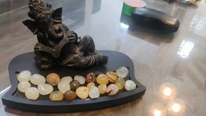 Elegant Lord Ganesha Reading Idol with Decorative