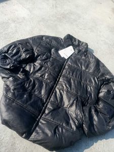 A Black Colour Puffer Jacket