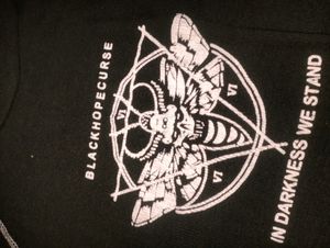 Black Top With White Coloured Work.