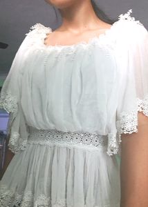 A Beautiful White Top Off Shoulder
