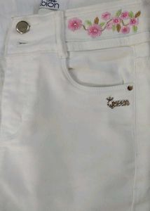 A Super Cool White Jean&#39;s With Neon Orange Top