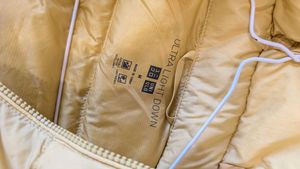 Uniqlo ultra light down jacket in butter yellow