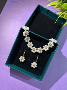 White Floral Necklace And Earrings