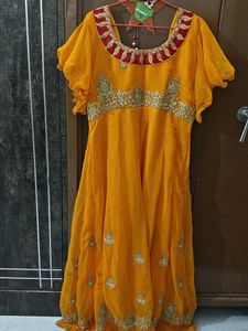 An Ethnic Gown Worn On A Festivals Flourishing..