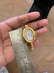 Elegant Gold-Tone Bangle Watch