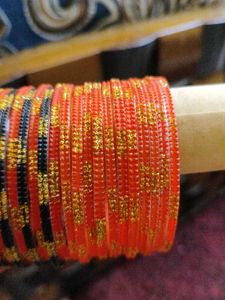 black and orange bangle set