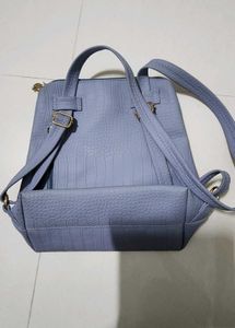 Baggit Textured Blue Backpack Bag