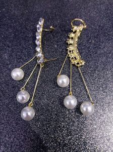 Zirconia Earrings With Dangling Pearls