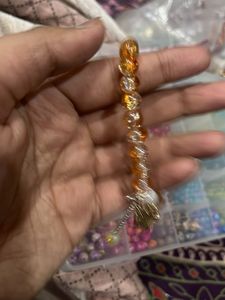 orange Beaded Bracelet with Charm