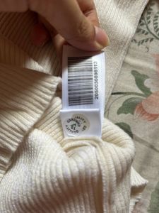 H&amp;M ribbed knit boat neck top .