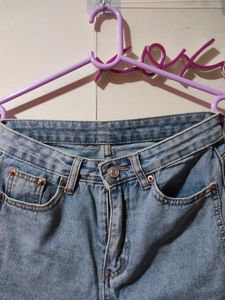 Blue Straight Leg Jeans With A Cut