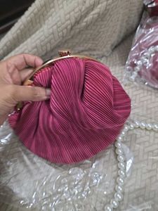Pink Potli Clutch With Pearl Handle